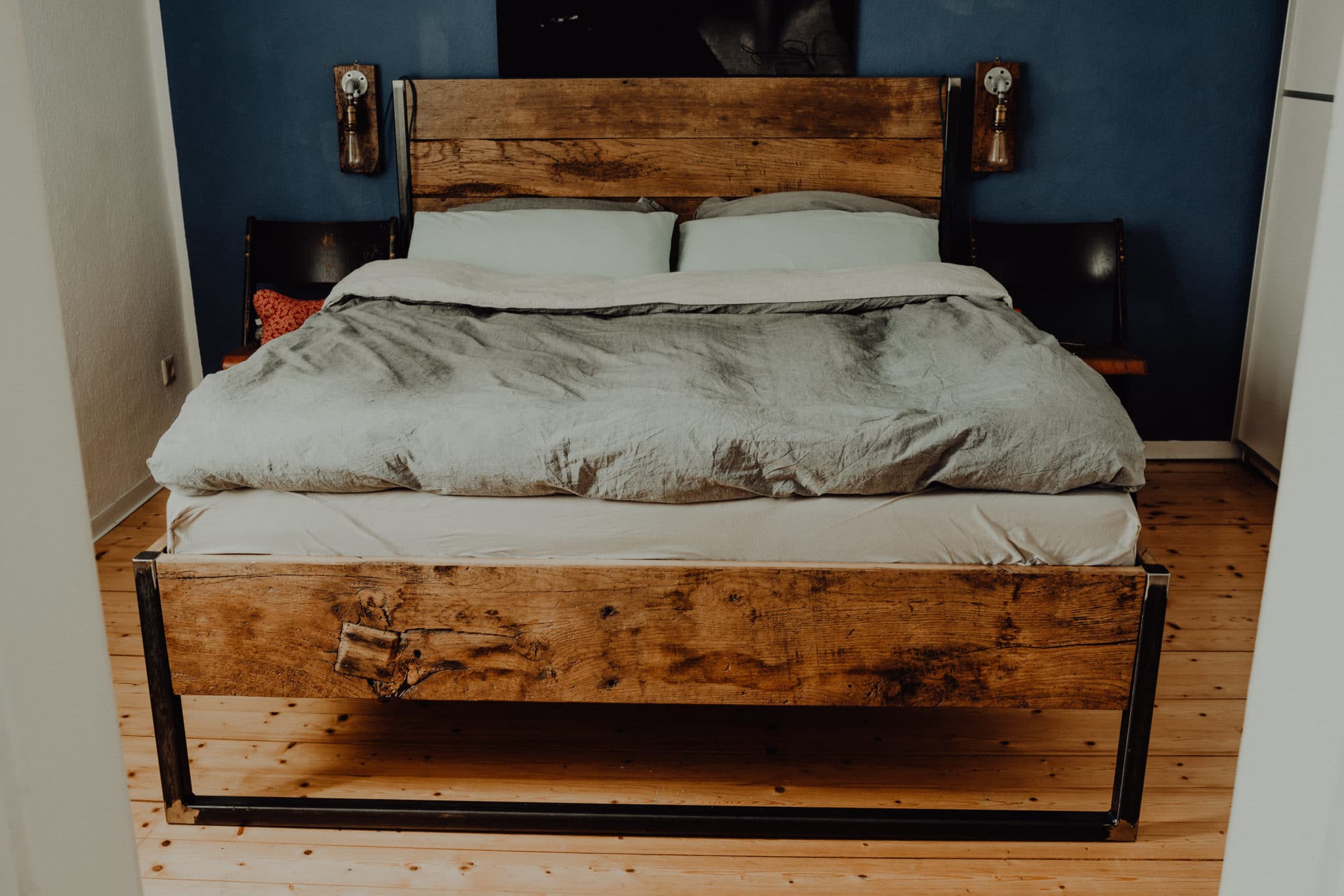 Industrial Style Bed made out of old barn wood, with a steel frame.

Unfortunately, this has already found a new home.